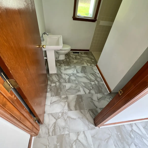 Triangle Flooring - Bathroom tile floor installation